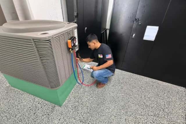 Fix It Fast technician performing commercial AC maintenance for Simi Valley business.